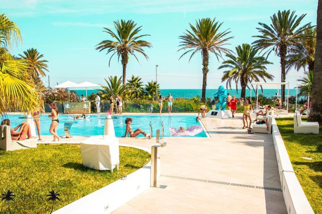 Miramare The Palace Resort Sanremo Exterior photo The pool at Nikki Beach Club, Porto Cervo, Sardinia